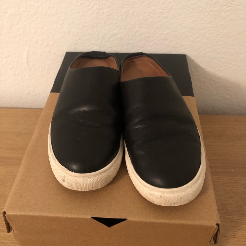 Black slip on sneakers